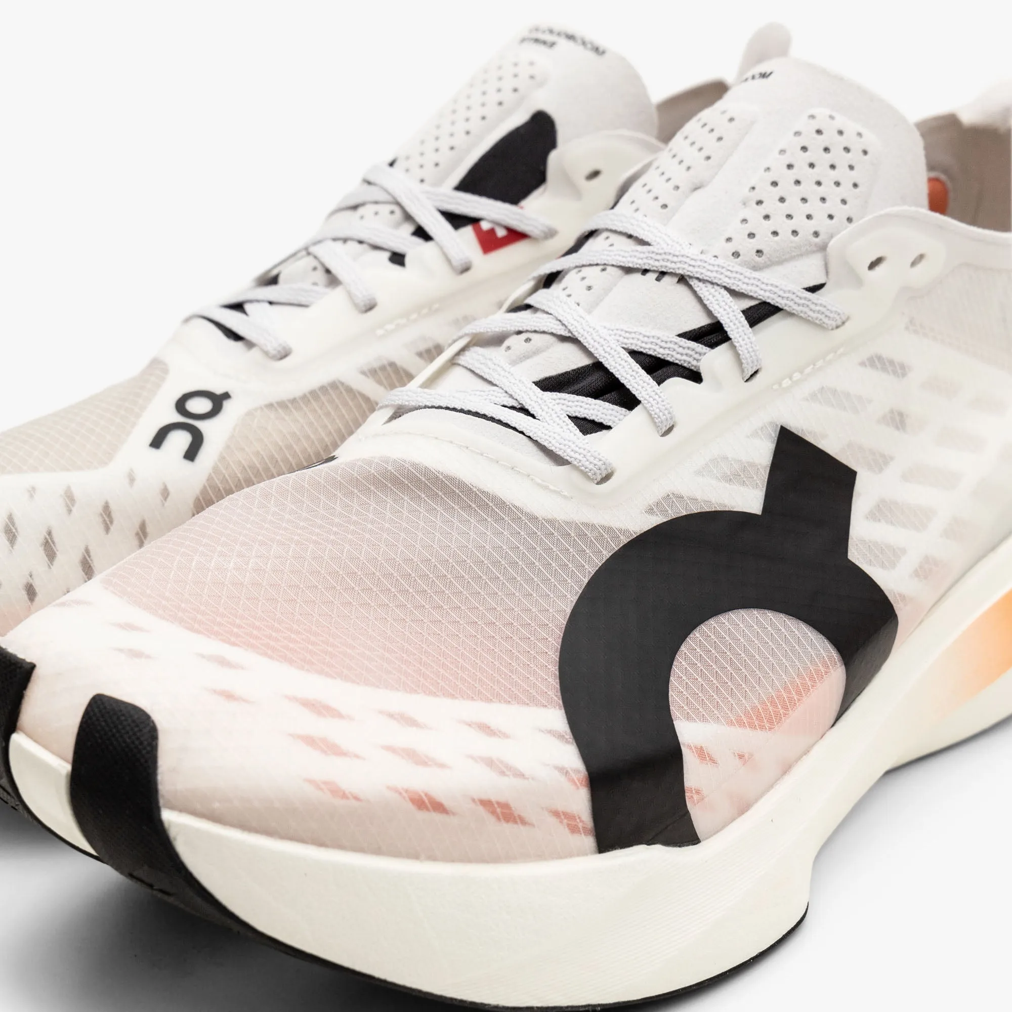 On Cloudboom Strike 1 / White / Black