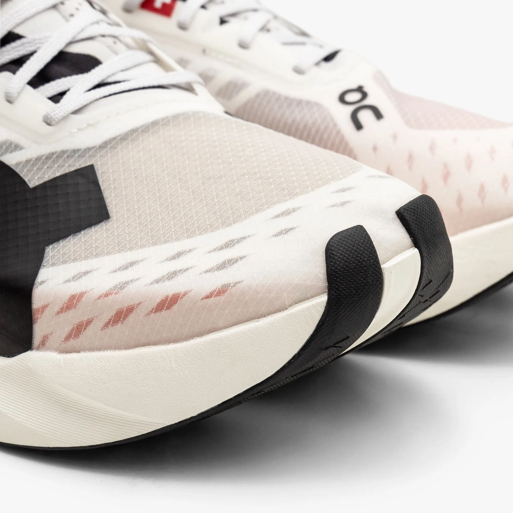 On Cloudboom Strike 1 / White / Black